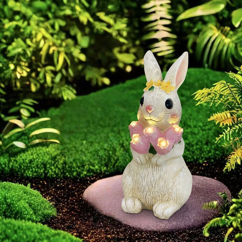 Thỏ ôm hoa bướm trang trí nhà cỏ ngoài trời tượng sân hiên trang trí đèn khí quyển năng lượng mặt tr