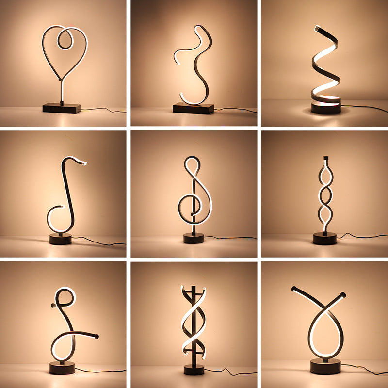 Đèn bàn Bắc Âu đèn đầu giường phòng ngủ đèn LED sáng tạo cá tính thanh không khí đèn ins gió giá trị