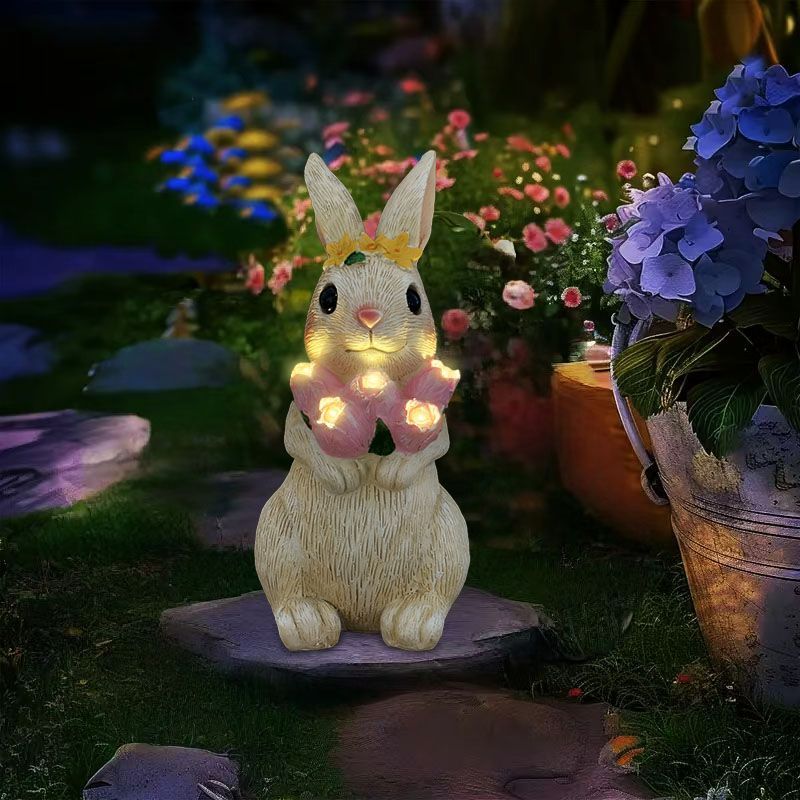 Thỏ ôm hoa bướm trang trí nhà cỏ ngoài trời tượng sân hiên trang trí đèn khí quyển năng lượng mặt tr