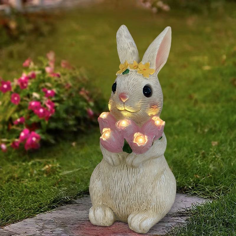Thỏ ôm hoa bướm trang trí nhà cỏ ngoài trời tượng sân hiên trang trí đèn khí quyển năng lượng mặt tr