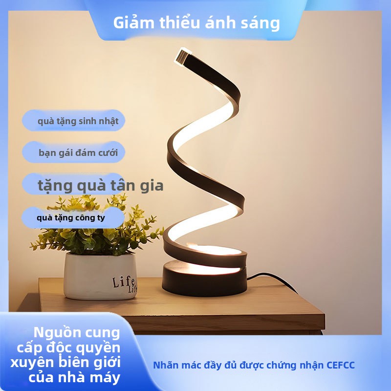 Đèn bàn Bắc Âu đèn đầu giường phòng ngủ đèn LED sáng tạo cá tính thanh không khí đèn ins gió giá trị
